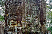 Angkor Thom - Bayon temple, second enclosure, corner towers seen from the central terrace 